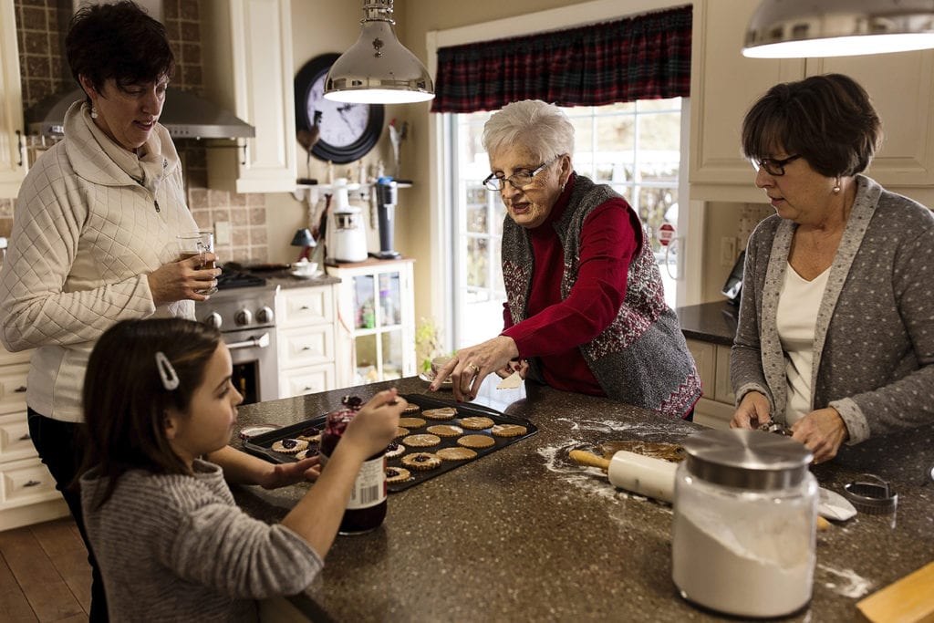 three generations bake cookies together in Cornwall family photos