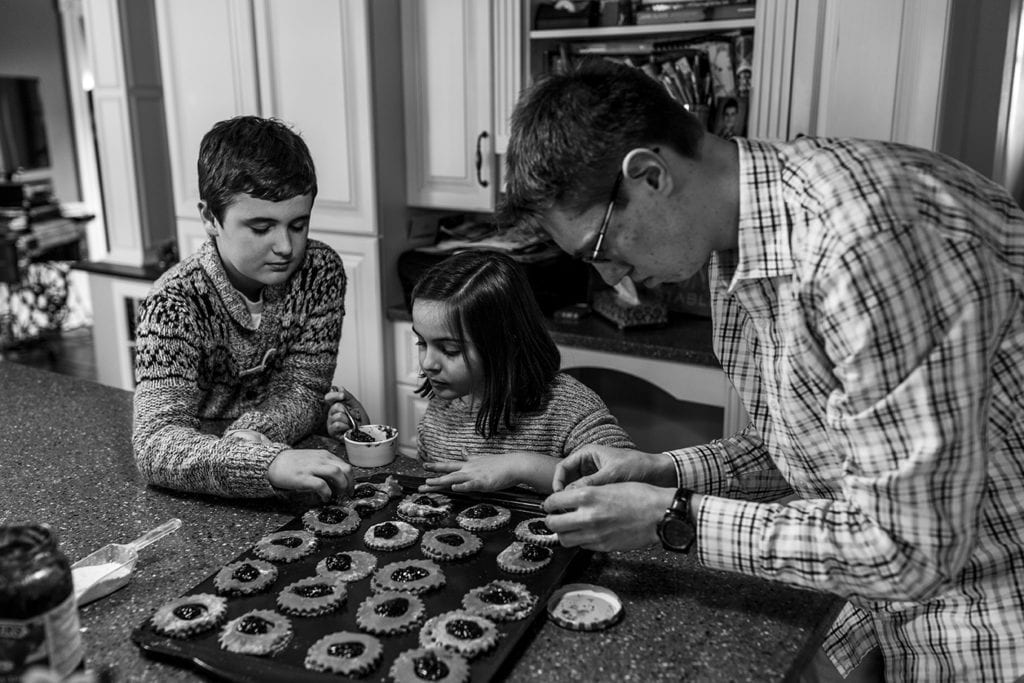 cousins bake jam cookies together