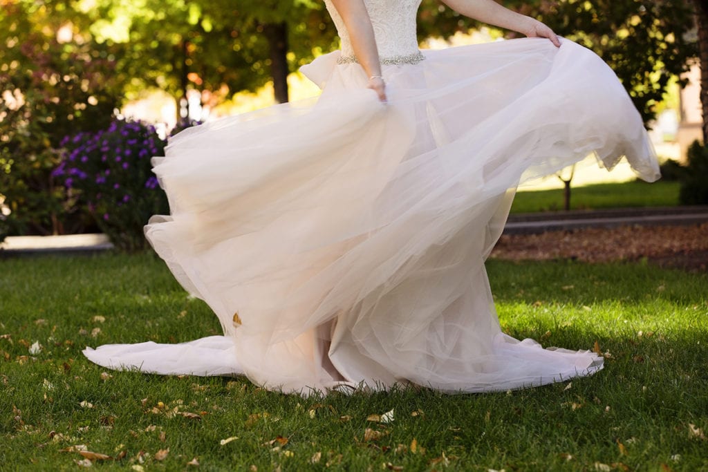 bride swirls blush wedding gown