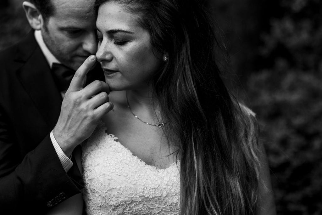 groom touches bride on the nose