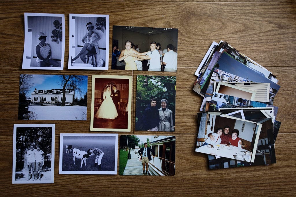 family photos arranged on the floor