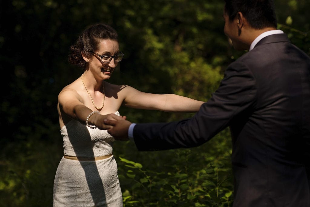 first look of bride and groom in nature wedding at vincent massey park ottawa