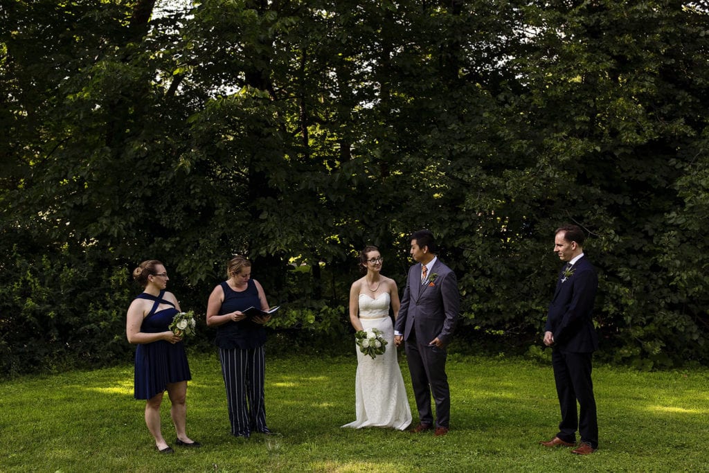 bride and groom are pronounced husband and wife at intimate ottawa park wedding