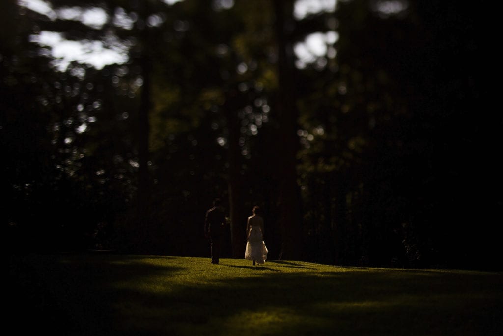 bride and groom stroll around grounds of vincent massey park ottawa