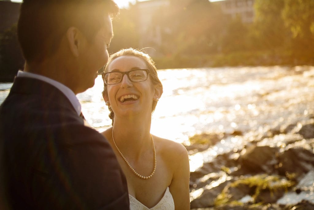 sunset couple laughing on beach in intimate Ottawa park wedding