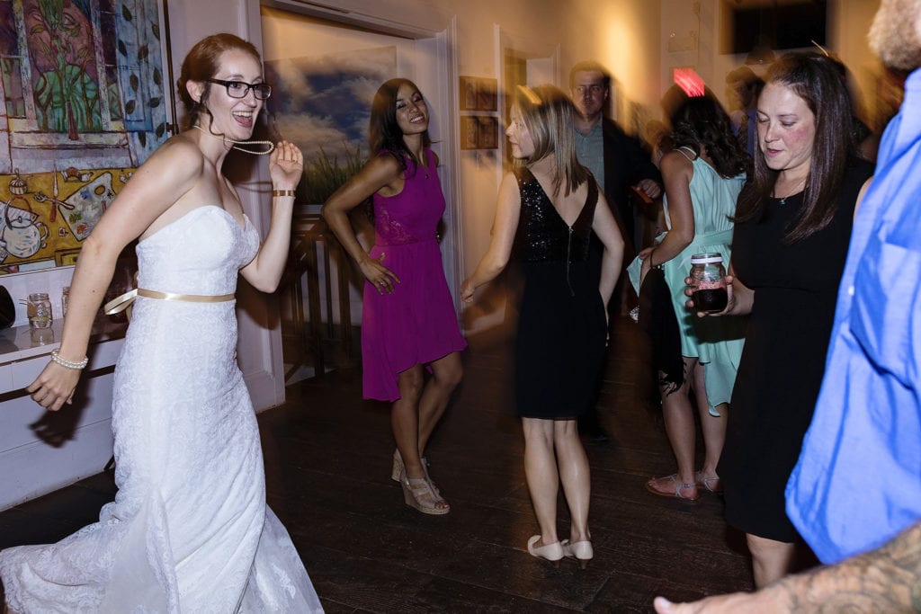bride dances as necklace bounces