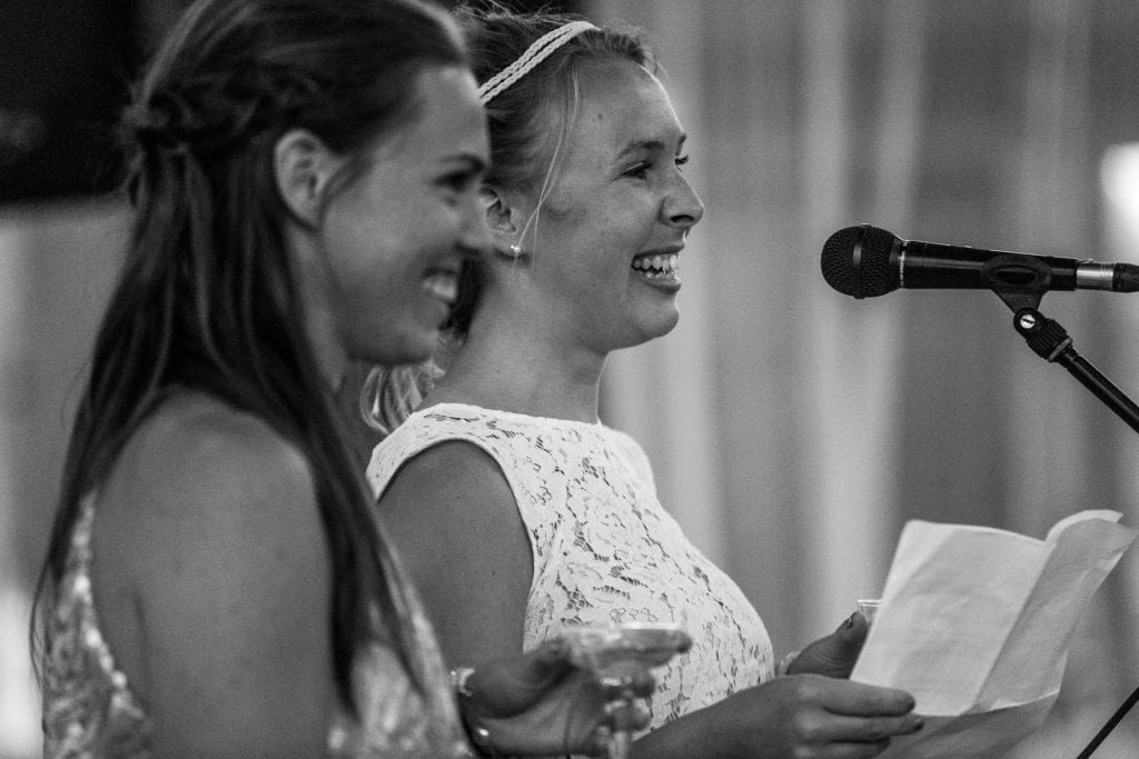 smiling sisters deliver toast to the bride during Picton Crystal Palace wedding