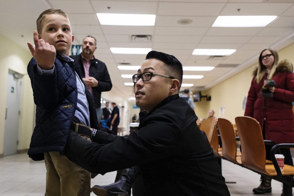 same-sex couple wait with son on Adoption day in Cornwall