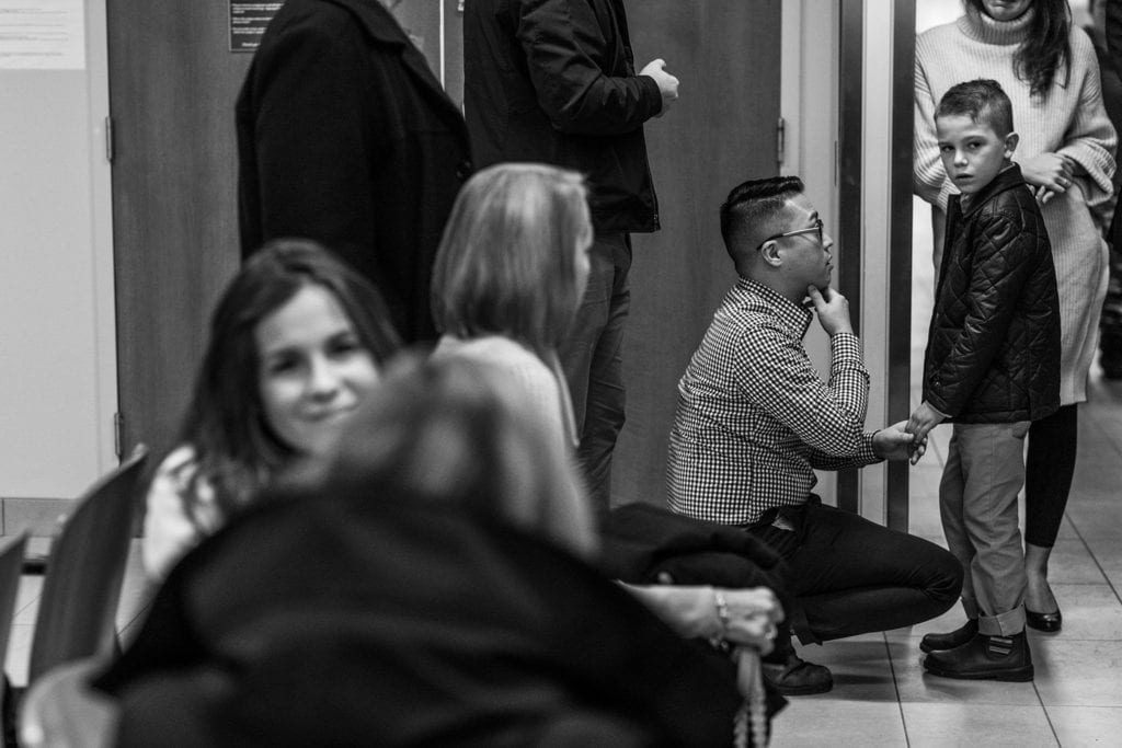 dad and son prepare before adoption ceremony at cornwall courthouse