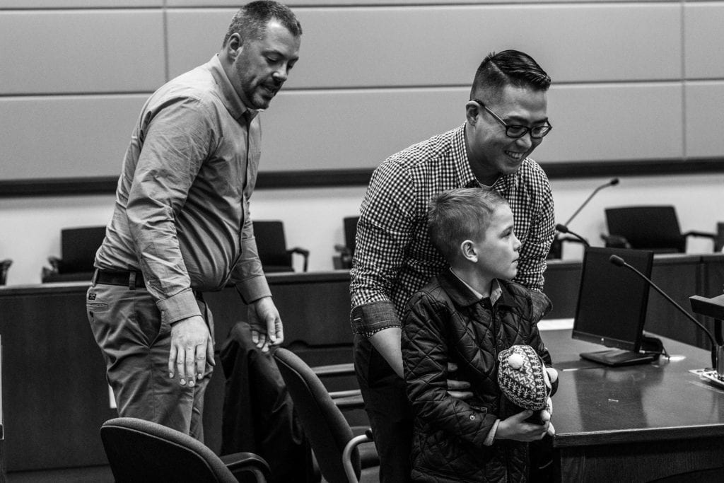 same-sex couple and adoptive son on Adoption day in Cornwall
