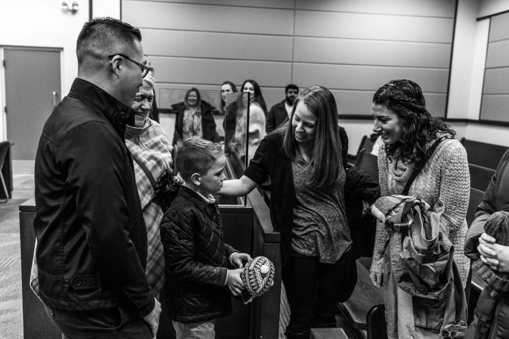 family celebrates adoption at courthouse in Cornwall