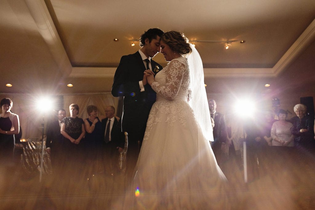 bride and groom dance close during first dance