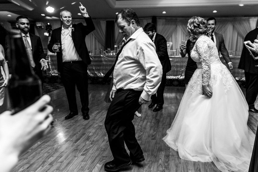 father of the bride on dance floor with bride during Best Western Cornwall wedding reception