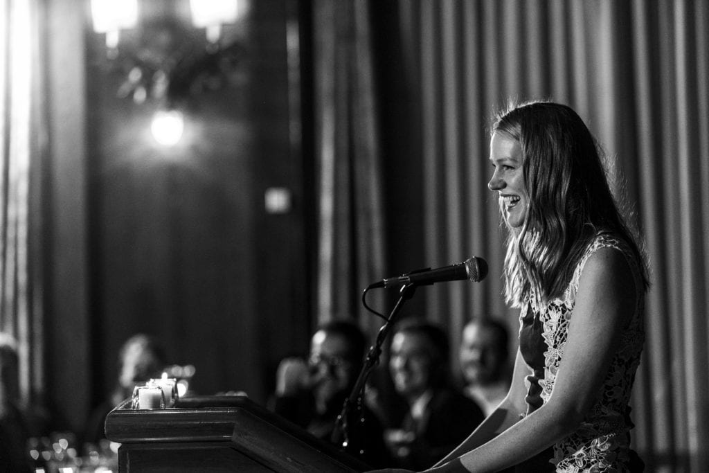 wedding guest recites rap lyrics while laughing