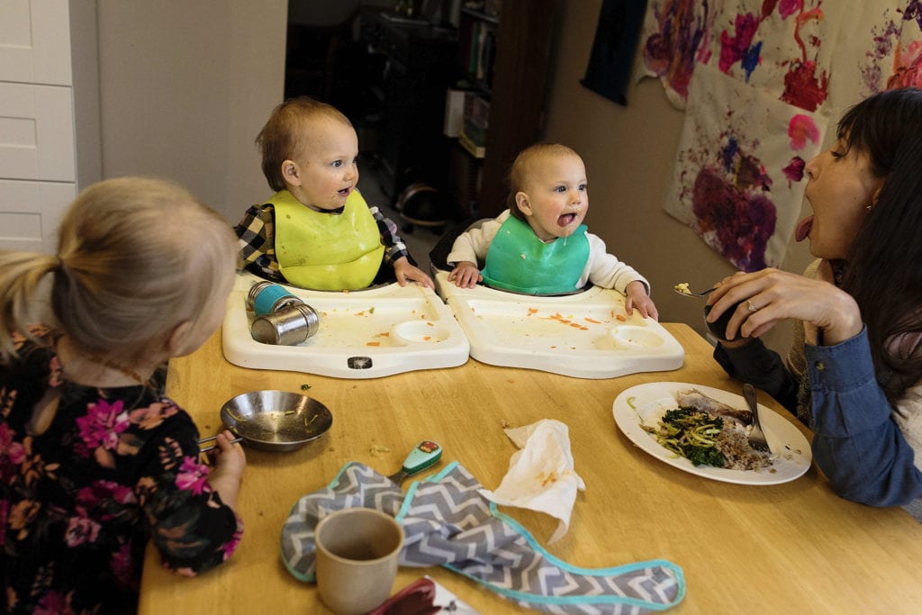 mom sticks out tongue at daughter who mimics