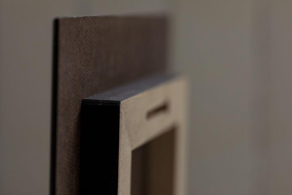 Vertical side view of floatmount with hook visible