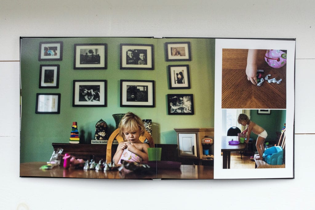 documentary family photography album pages featuring girl playing with candy bucket