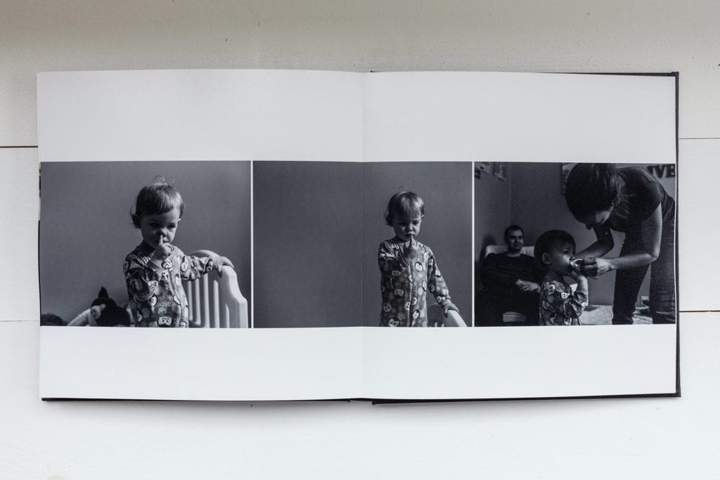 documentary family photography album pages featuring toddler pick her nose and eating it