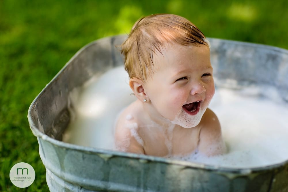 Cornwall child smiling in washtub