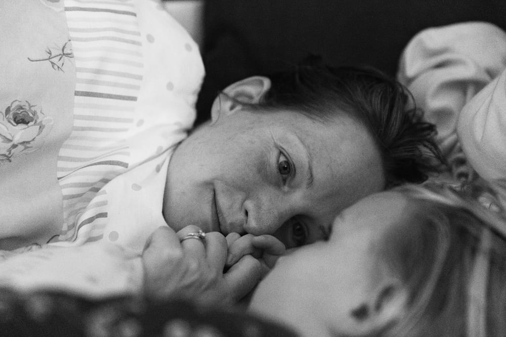 Stockholm mom in bed with daughter