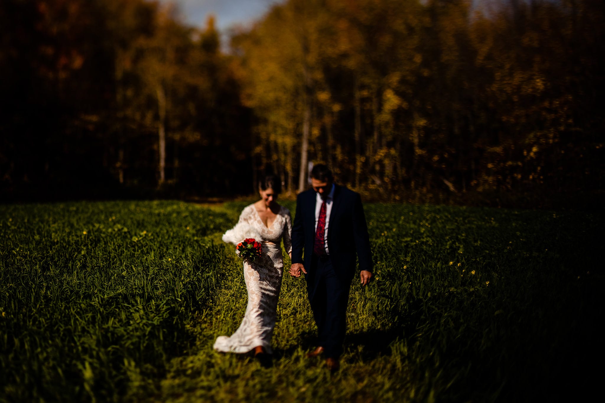 bride and groom leaving woods after Intimate Cornwall Forest Wedding