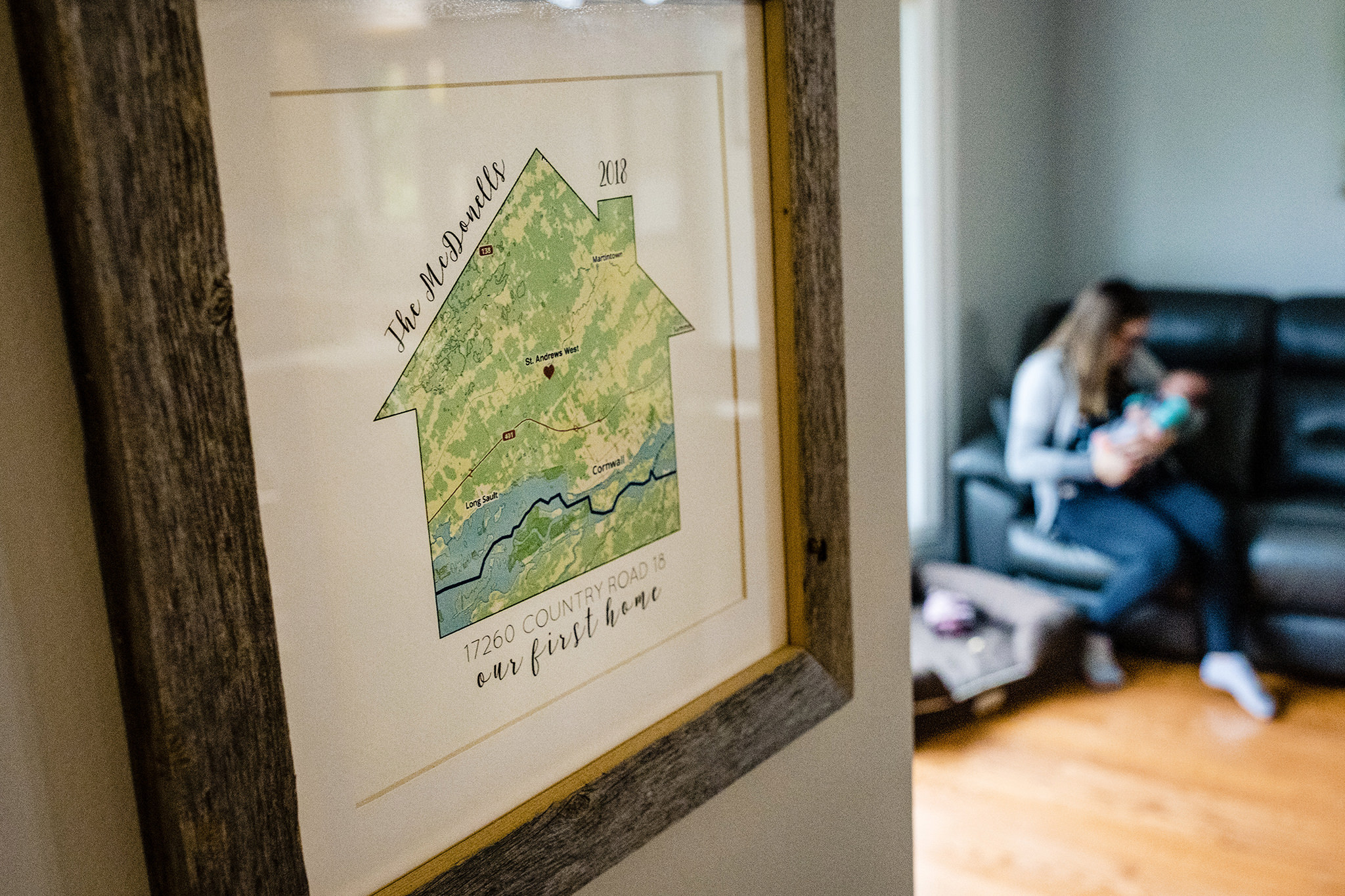 Photo of personal frame with mother and baby in background