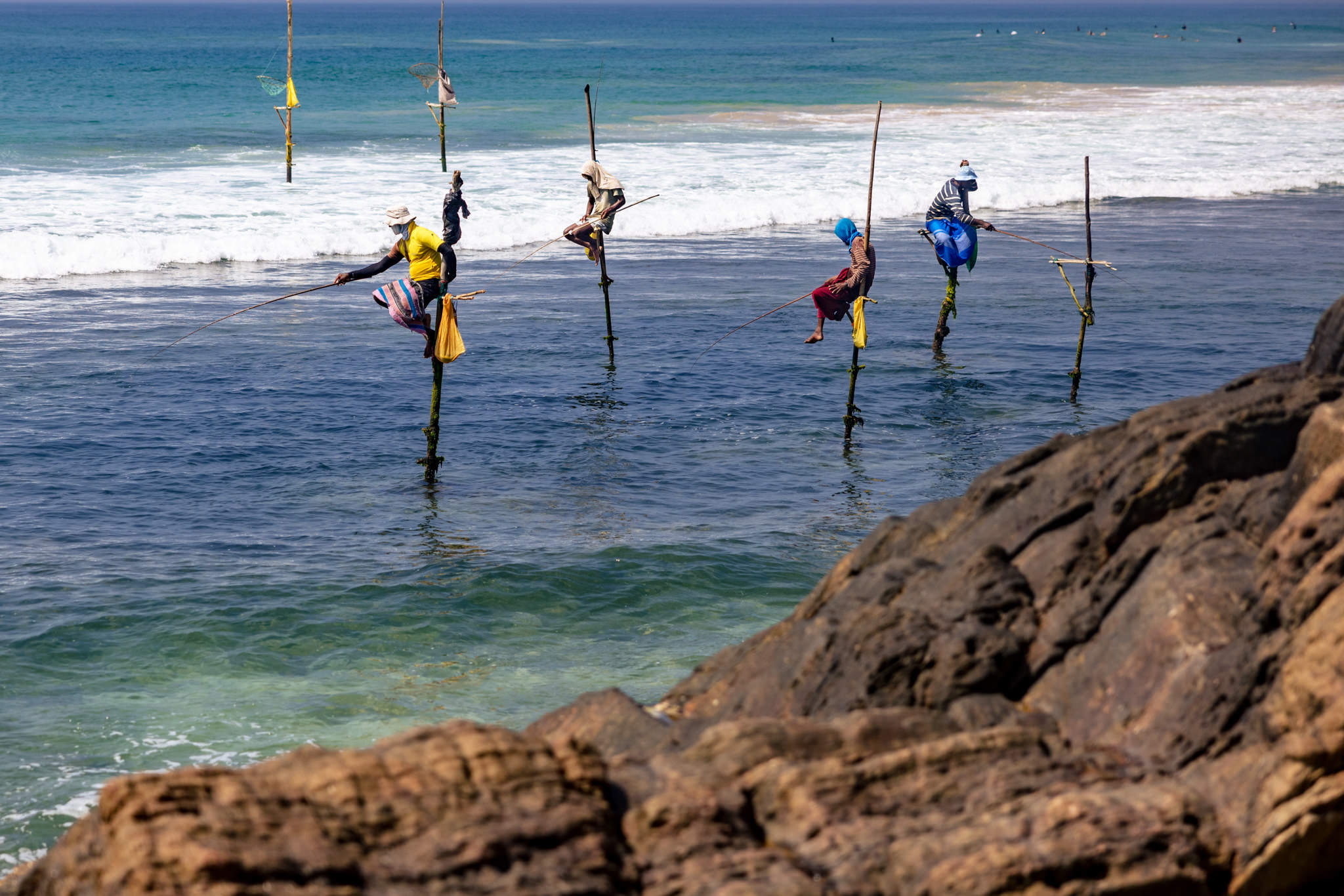 Traditional stilt fishermen outside of Talpe on Sri Lanka's south coast