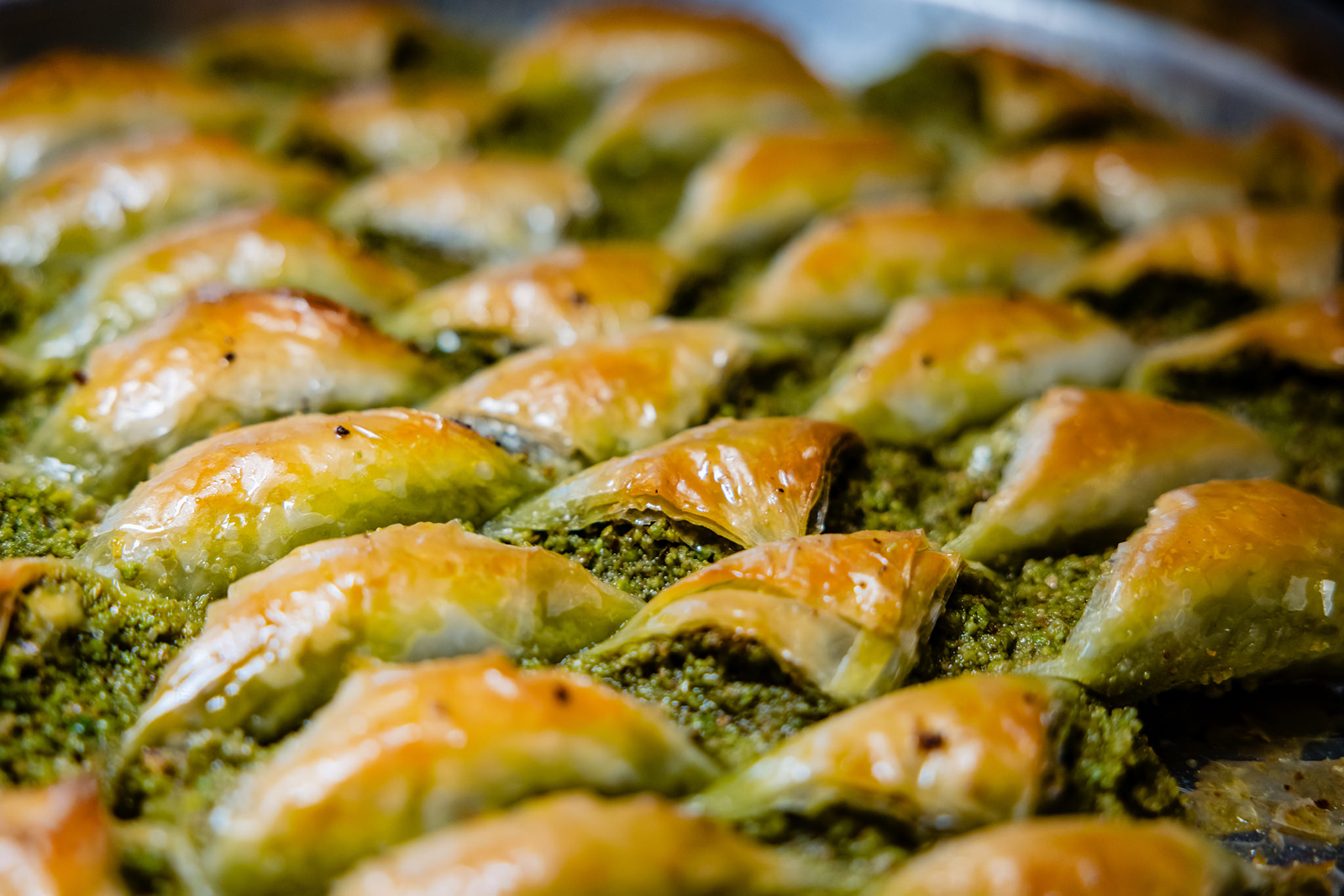 Close up shot of Gaziantep baklava featuring Antep pistachios
